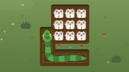 Snake on a looping dirt path approaching a cluster of number-2 animal tiles in a meadow
